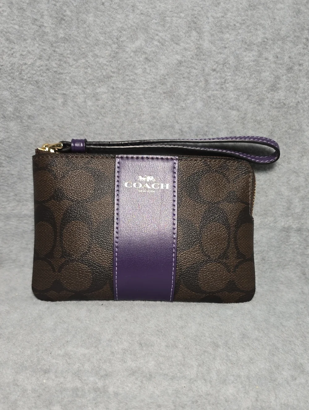 Coach Brown Signature Coated Canvas Wristlet with Purple Leather Center Stripe